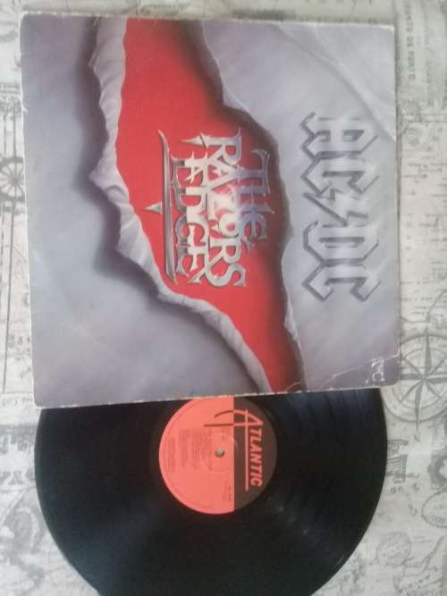 Judas Priest British Steel Le Zeppelin III and ACDC The Razor's Edge LPs